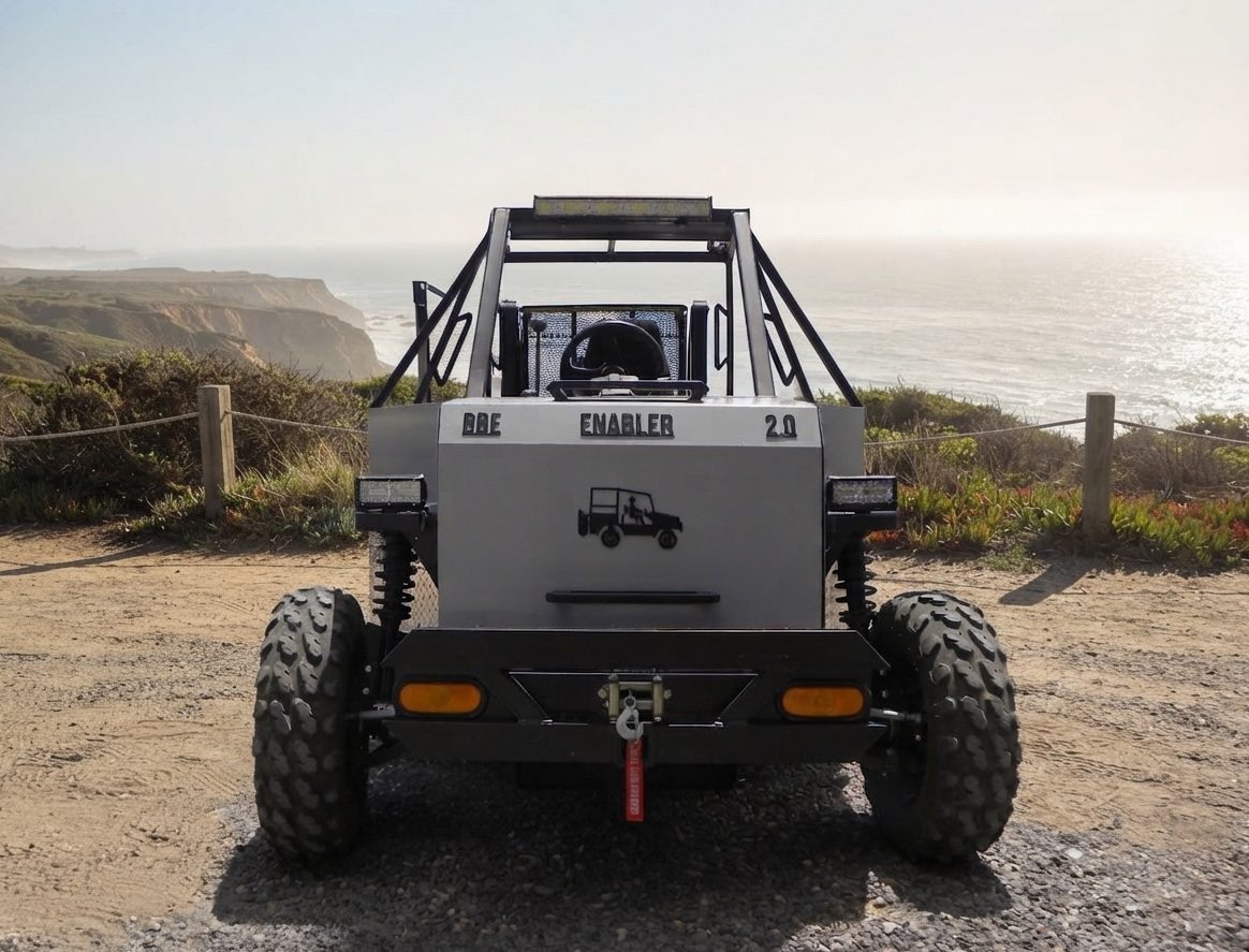 The Enabler 2.0 parked rear-facing on a coastal bluff overlooking the ocean
