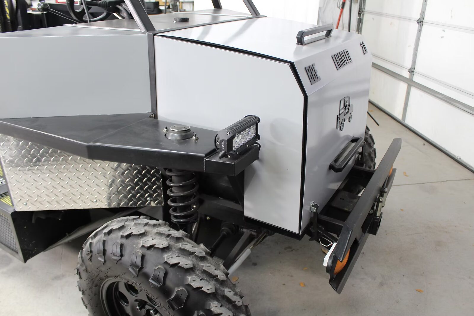 Enabler 2.0 coil-over suspension and off-road tire detail