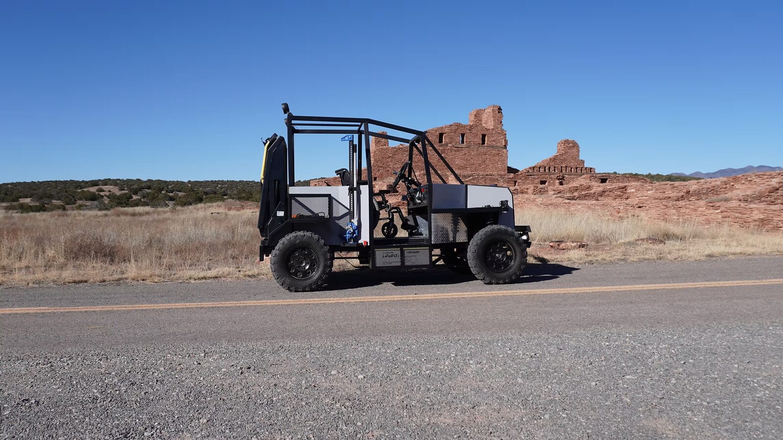 Enabler 2.0 parked outdoors near historic ruins